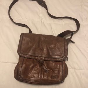 The Sak brown purse crossbody backpack